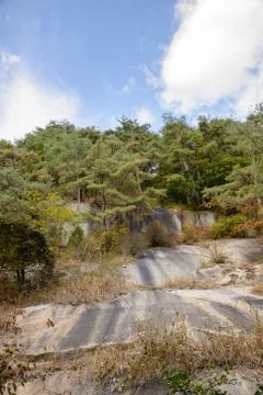 Huge rock in a mountain Stock Photos