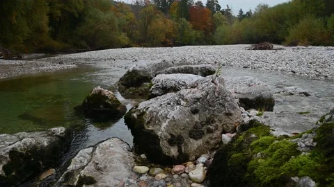Huge rocks in the foreground with stream flowing downstream Video stock 171109510
