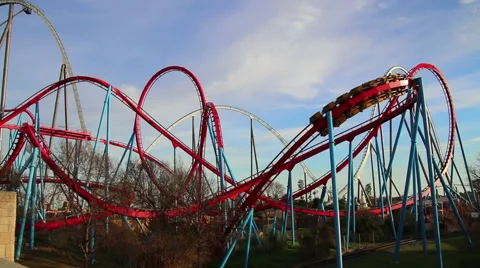 Huge Roller Coasters at an Amusement Park Stock Footage 45526679