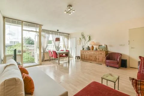 Huge room with a full wall window Stock Photos