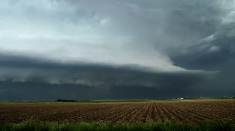 Huge shelf cloud out ahead of a cool outflow of air from a thunderstorm over Stock Footage 59513741