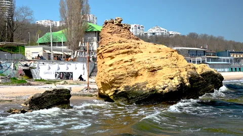 Huge shell stone on Otrada beach in Odessa, Ukraine Stock Footage 239406317