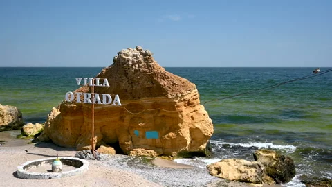Huge shell stone on Otrada beach in Odessa, Ukraine 4K Stock Footage 239606940