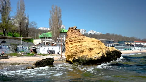 Huge shell stone on Otrada beach in Odessa, Ukraine 4K Stock Footage 239607970