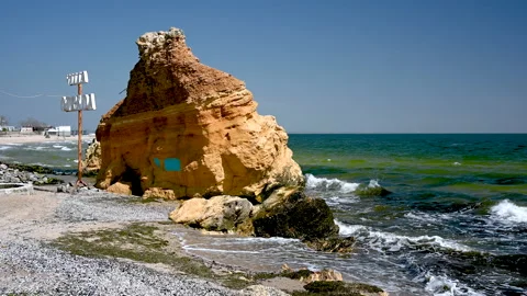 Huge shell stone on Otrada beach in Odessa, Ukraine 4K Stock Footage 239608218