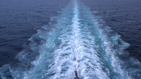 Huge ship leaving ship wake on the sea as it sails Stock Footage 246983803