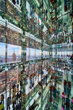 Huge skyscraper interior mirror reflections Summit One with New York City Stock Photos