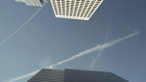 Huge Skyscraper reflection with blue glass windows at business district in Stock Footage 119361901