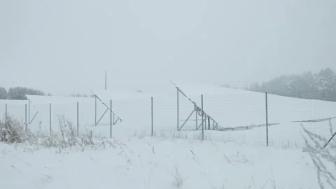 Huge solar panels covered in thick snow in Estonia Stock Footage 228028076