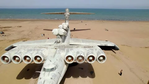 Huge Soviet Plane Lun on the beach Stock Footage 195846029