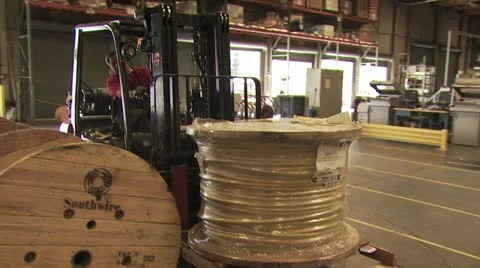 Huge Spools of Wire Being Moved With A Forklift Video stock 18964284