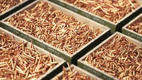 Huge stack of military boxes filled with rifle and machine gun ammunition. 4KHD Stock Footage 102668724