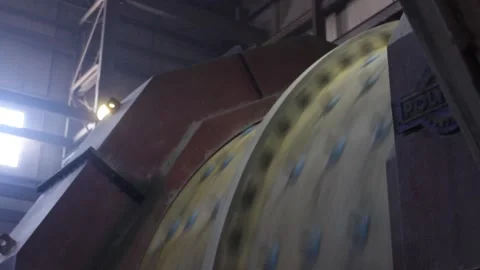 A huge stone crushing machine works in a factory, close-up. Stock Footage 122214101