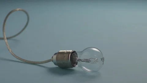 A huge stone destroys a cool lamp. On a light blue background a vintage Stock Footage 129890600