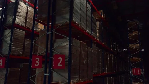 A huge storage of parcels. Creative. Large shelving with sealed boxes with Stock Footage 226222973