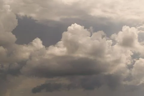 Huge storm clouds high in the sky. Stock Photos
