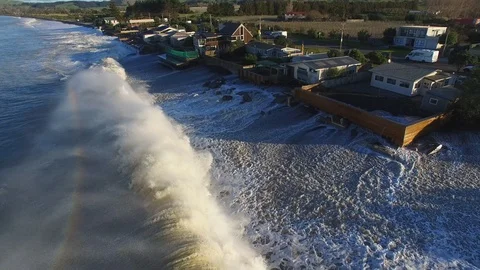 Huge storm driven waves pound coastal properties Stock Footage 95057253