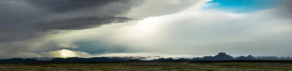 Huge storm in the icelandic highland. Dramatic clouds and sky. Stock Photos