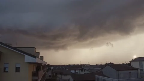 Huge storm passes over during sunset. Stock Footage 197678120
