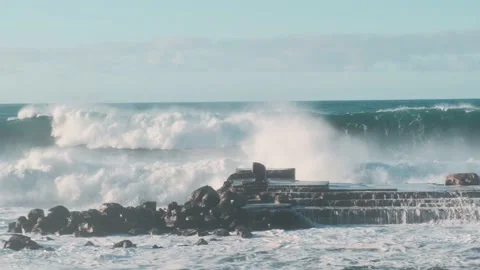 Huge storm waves breaking up the coastline Stock Footage 147191263
