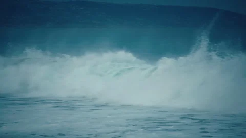 Huge storm waves explode into white sea spray as powerful ocean surf  Stock-Footage 347978919