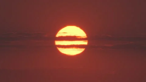 The huge sun and stripe clouds telephoto view Stock Footage 160202290