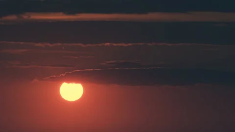 The huge sun behind the cloud Stock Footage 167331072