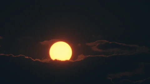 The huge sun behind the stormy clouds Stock Footage 167331591