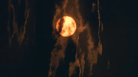 The huge sun behind the vertical stormy clouds Stock Footage 167332771