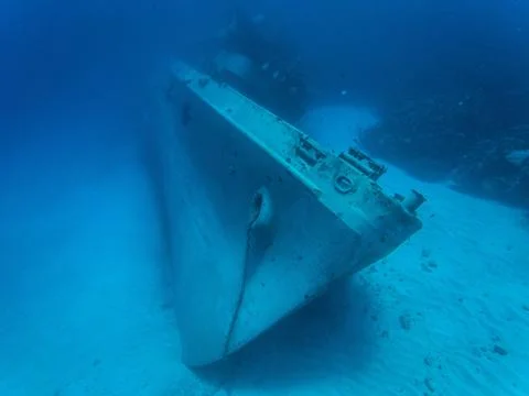 A huge sunken abandoned ship at a depth of 30 meters in crystal clear water Stock Photos