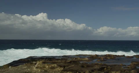 Huge Surf Breaking on Rocks 2k Stock Footage 37919803