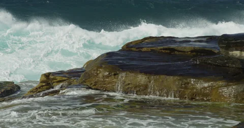 Huge Surf Breaking on Rocks 2k Stock Footage 37933213