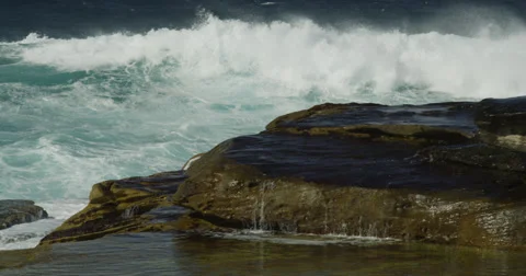 Huge Surf Breaking on Rocks 2k Stock Footage 37950991