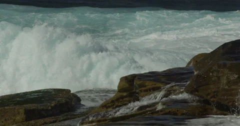 Huge Surf Breaking on Rocks 2k Stock Footage 37962691