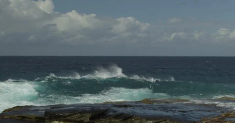Huge Surf Breaking on Rocks 2k Stock Footage 37998150