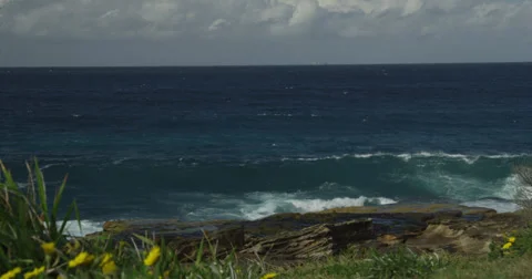 Huge Surf Breaking on Rocks 2k Stock Footage 38004003