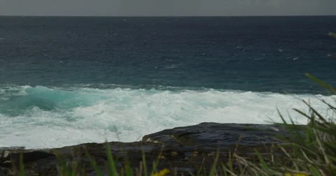 Huge Surf Breaking on Rocks 2k Stock Footage 38026500