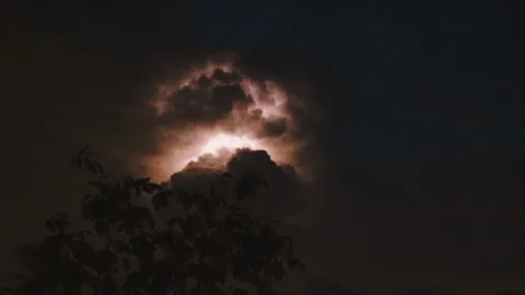 Huge Thunderstorm Cloud with lighting spark (flash) inside on a cloudy night  스톡 동영상 107432417