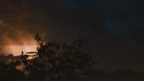 Huge Thunderstorm Cloud with lighting spark (flash) inside on a cloudy night  Stock Footage 107432427