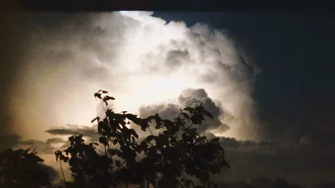 Huge Thunderstorm Cloud with lighting spark (flash) inside on a cloudy night  Stock Footage 107432436