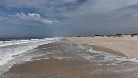 Huge totally empty beach with large area of dunes on the coast of Portugal Stock Footage 201731991