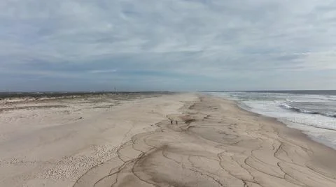 Huge totally empty beach with large area of dunes on the coast of Portugal Stock Photos