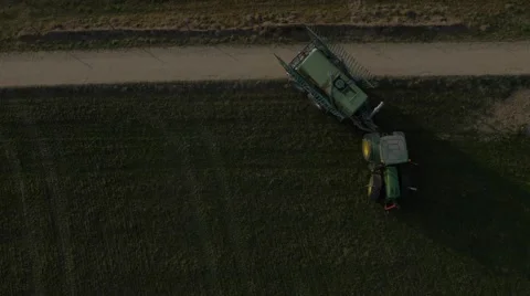 Huge tractor with trailer, spreading liquid manure. Stock Footage 48016435