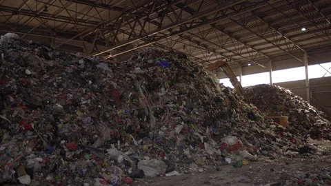 Huge trash dump processing factory with a lot of plastic and other human created Stock-Footage 120805066