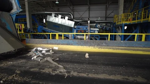 Huge trash dump processing factory with a lot of plastic and other human created Stock-Footage 120805453
