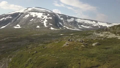 Huge valley and snowfields on a mountain Stock Footage 233666301