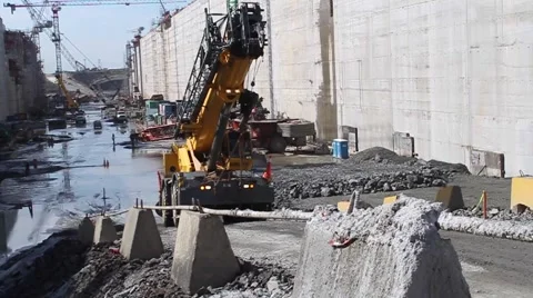 Huge vehicle passes on ground level panama canal third set of locks Stock Footage 44442060