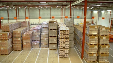 Huge Warehouse With Lots Of Sorted Out Pallets Stock Footage 129398913