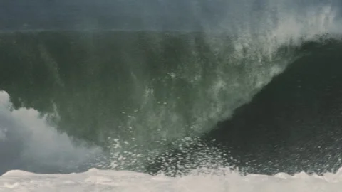 Huge Wave Arcs and Crashes With Spray Explosion, Long Lens Slow Motion Stock Footage 309979139