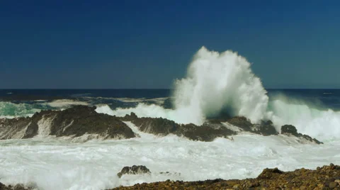 Huge Wave Crashing on Rocks Stock-Footage 30484760